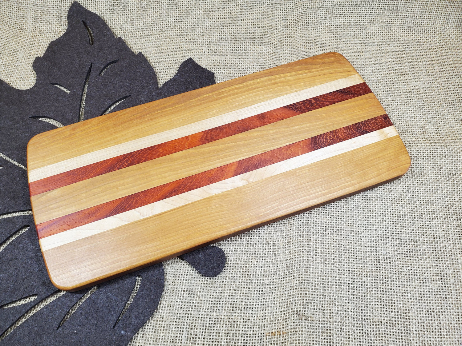 Cherry, Padauk & Maple Cutting Board image 0