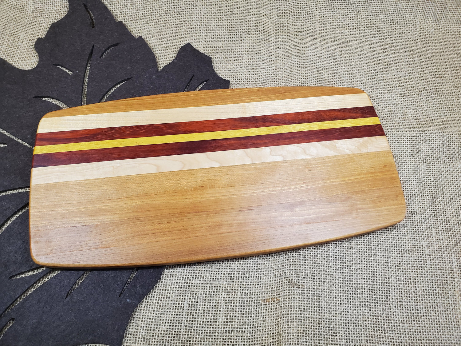 Cherry, Maple, Padauk & Yellowheart Cutting Board image 0