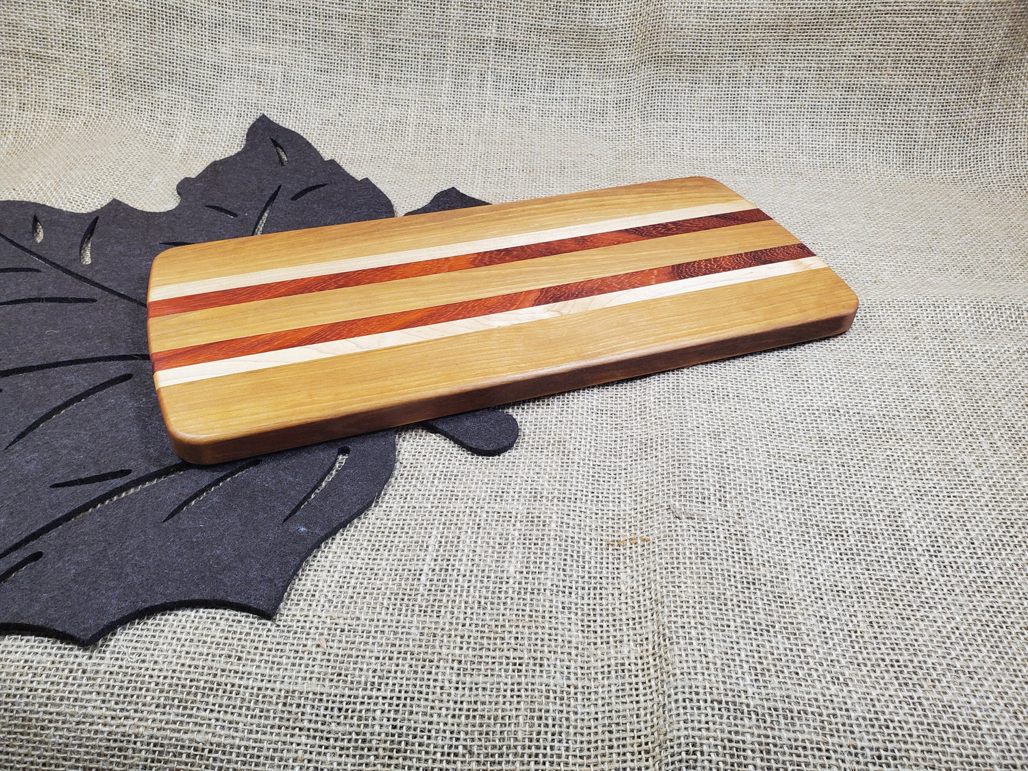 Cherry, Padauk & Maple Cutting Board image 1