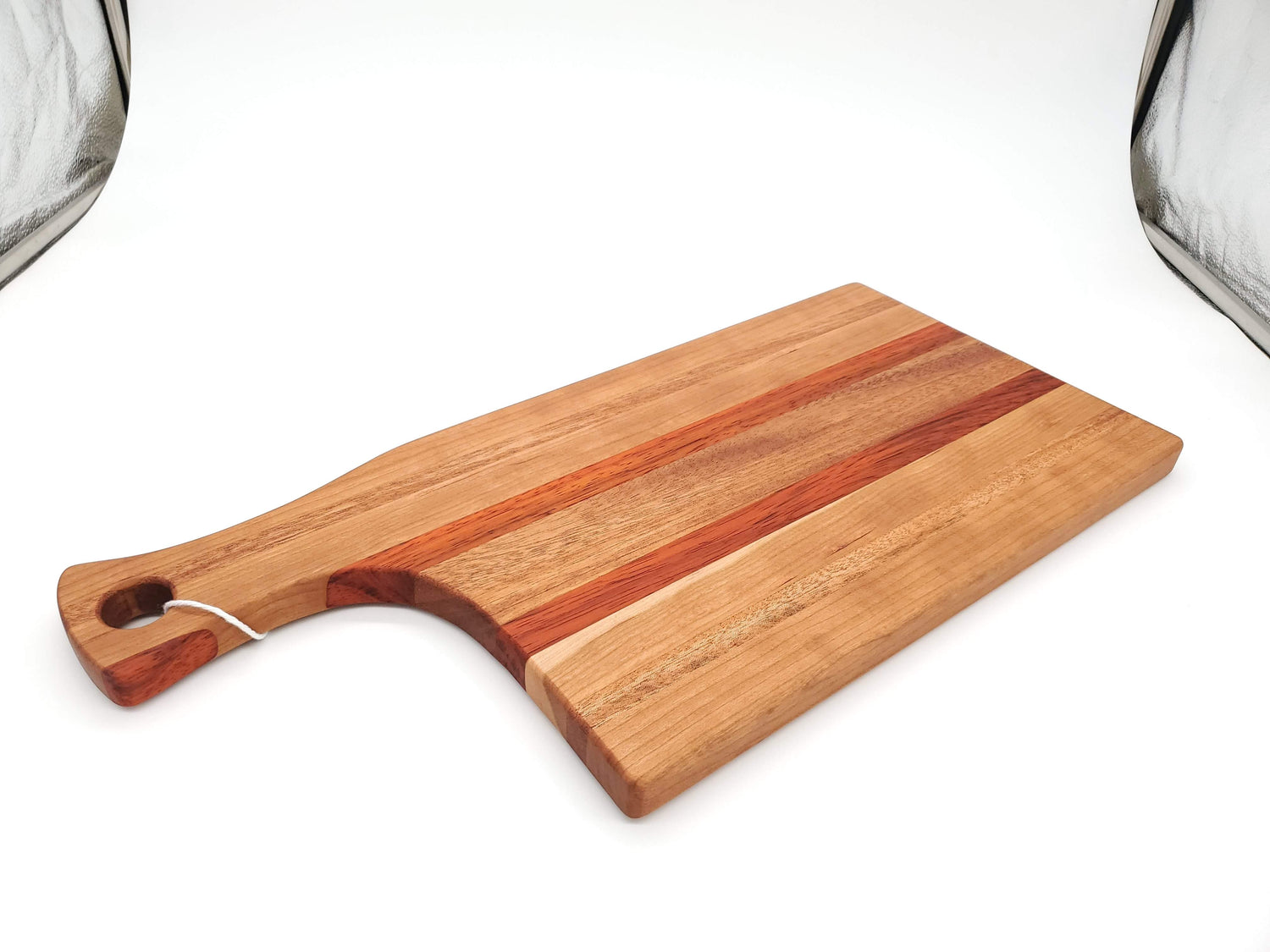 Mahogany, Cherry & Padauk Cutting Board with handle image 0